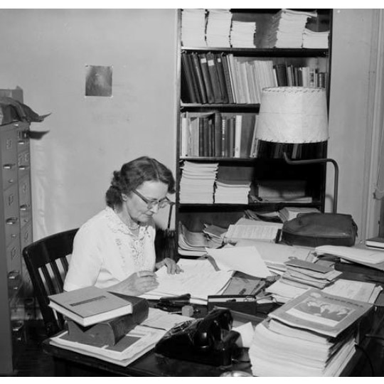Ingeborg Schmidt working at her desk